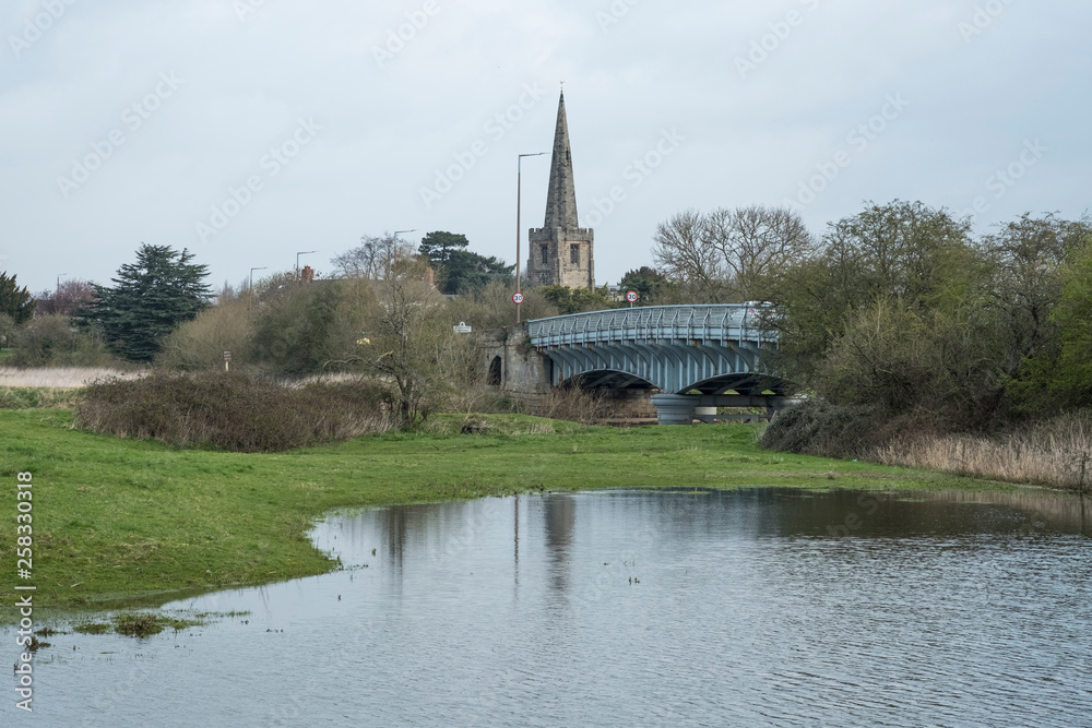 Village church and bridge in Sawley, Derbyshire, UK