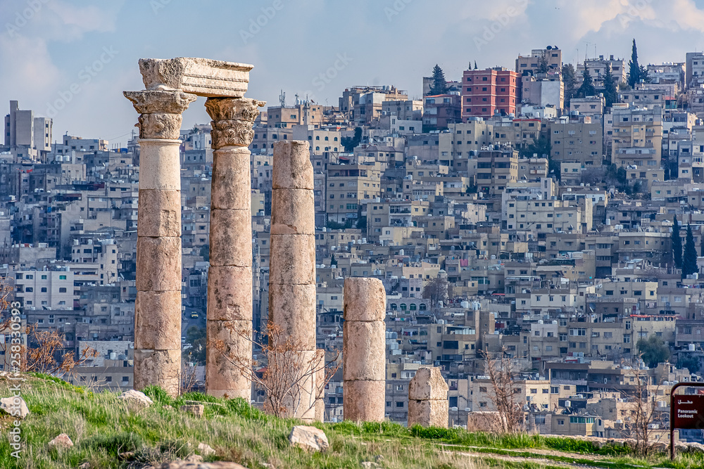 Ruins of the Temple of Hercules on the top of the mountain of the Amman citadel with a view of the ancient Middle Eastern city