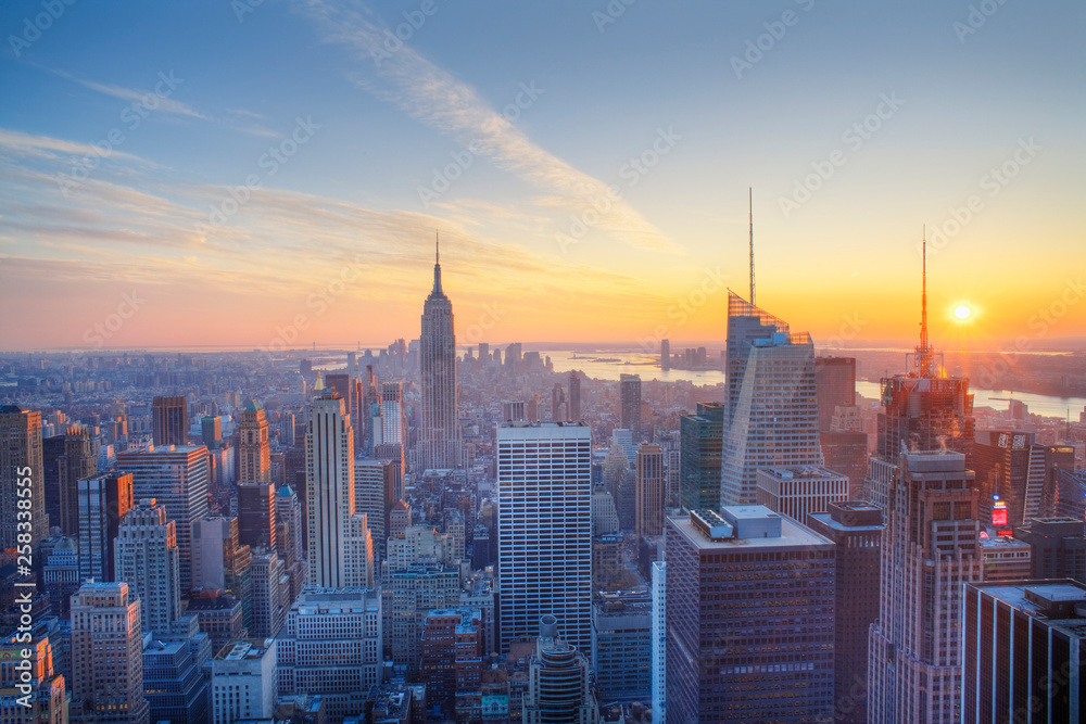 Empire State building and Manahttan skyline at sunset new york city new york usa