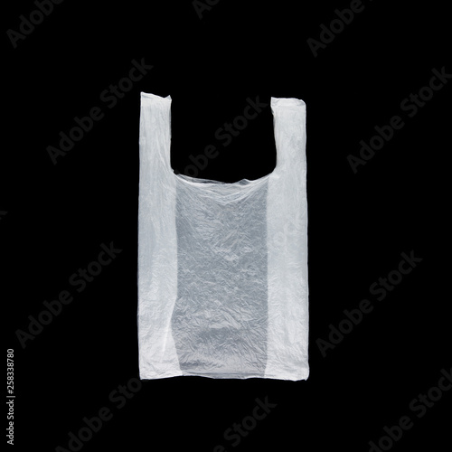 White plastic bag on black background