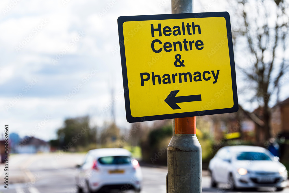 farmacy health centre directional road sign on road in uk farmacy health centre directional road sign on road in uk