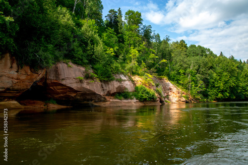 Landscape with river  cliff  and forest in Latvia.