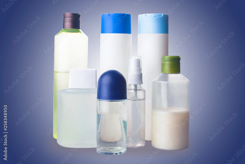 Flat lay composition with bottles of perfume on color background Flat lay composition with bottles of perfume on color background