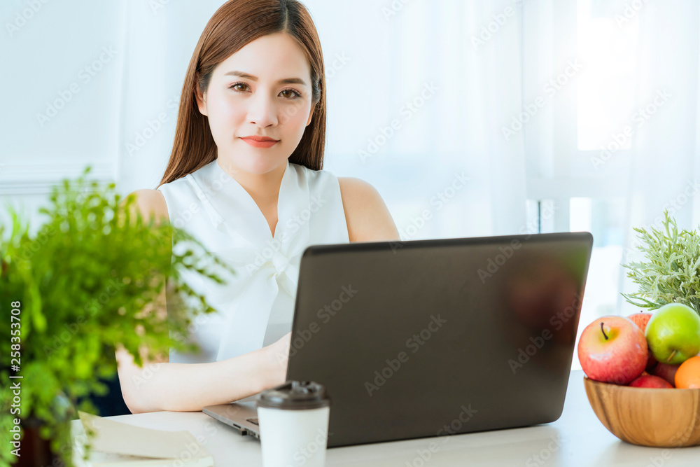 smart executive asian woman white dress meeting with coworker with laptop presentation office background smart executive asian woman white dress meeting with coworker with laptop presentation office background
