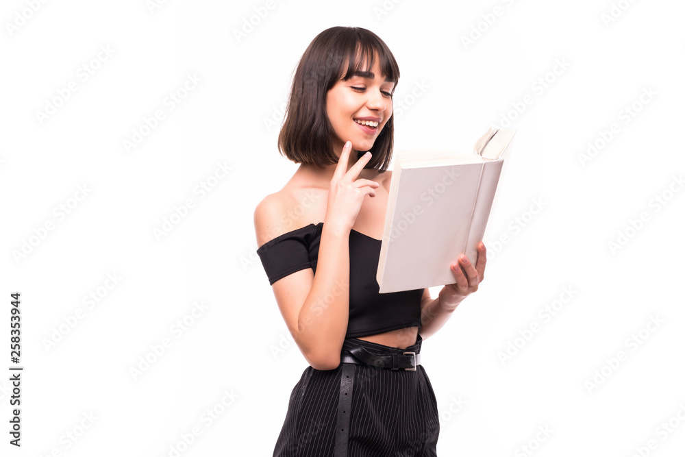 Young brunette girl with book isolated on a white background Young brunette girl with book isolated on a white background