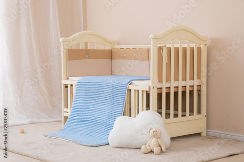 White children's beds, blue mattresses