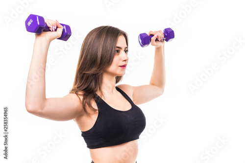 Young pretty Girl with barbells isolated on white background