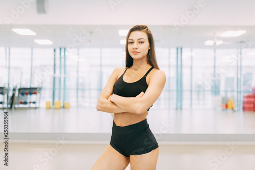 Beautiful girl in the gym. Sports and fitness, healthy lifestyle. © pavelvozmischev