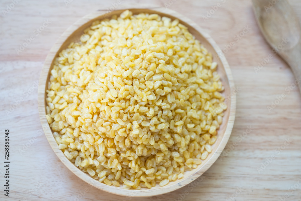 A pile mung dal or moong dal. Mung dahl dried food ingredient. A pile mung dal or moong dal. Mung dahl dried food ingredient.