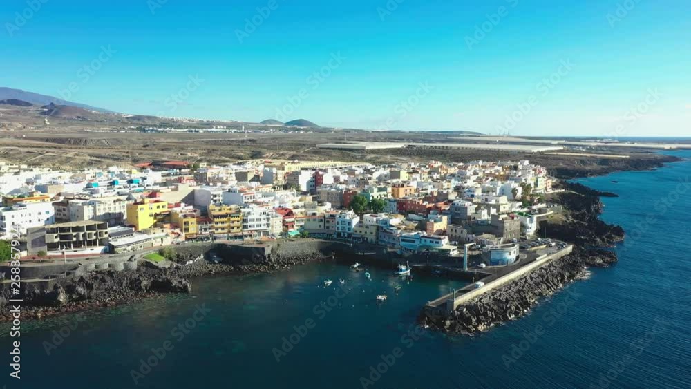 Drone approaching Los Abrigos, Tenerife from the seaside. Drone approaching Los Abrigos, Tenerife from the seaside.