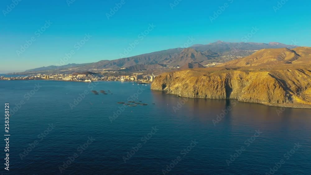 Drone approaching cliffs near Palm de Mar during sunset. Drone approaching cliffs near Palm de Mar during sunset.