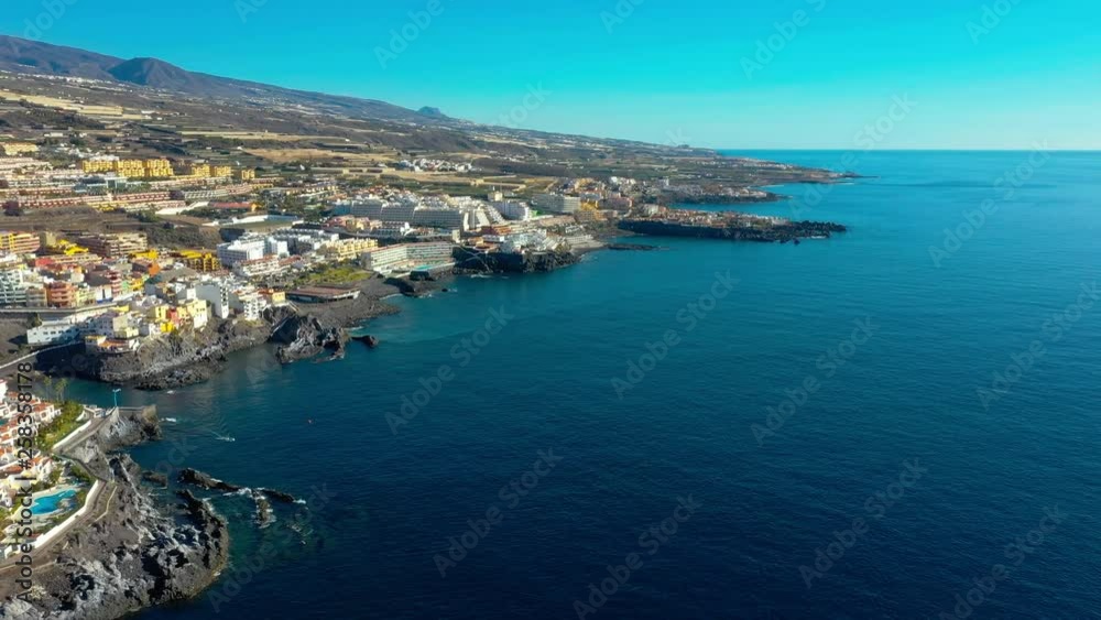 Drone flying along the coastline of Los Gigantes, Vulcanic rocks marking the territory. Drone flying along the coastline of Los Gigantes, Vulcanic rocks marking the territory.