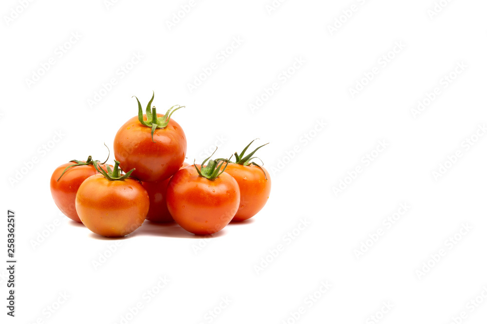 Tomato closeup on white background. Selective focus and crop fragment Tomato closeup on white background. Selective focus and crop fragment
