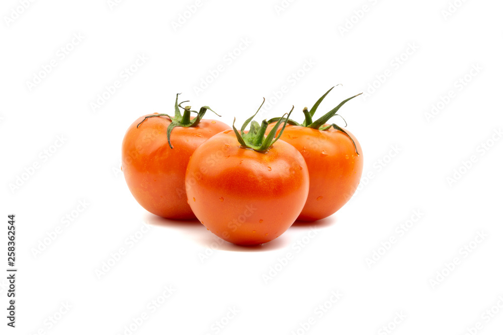 Tomato closeup on white background. Selective focus and crop fragment Tomato closeup on white background. Selective focus and crop fragment