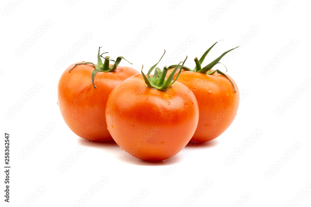 Tomato closeup on white background. Selective focus and crop fragment Tomato closeup on white background. Selective focus and crop fragment