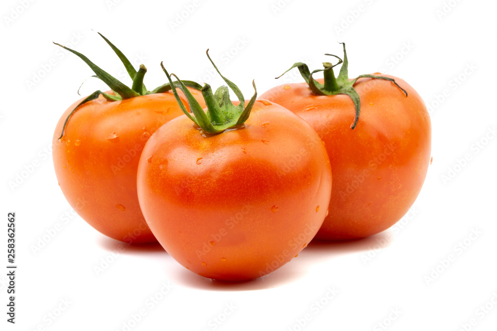 Tomato closeup on white background. Selective focus and crop fragment Tomato closeup on white background. Selective focus and crop fragment