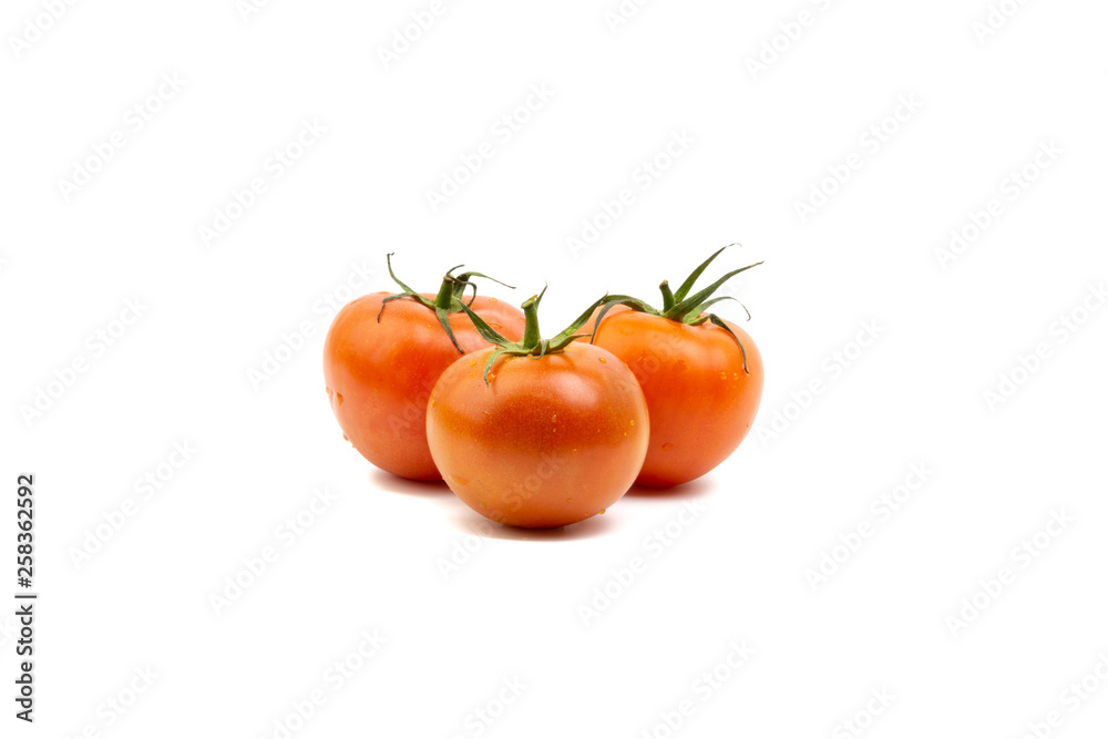 Tomato closeup on white background. Selective focus and crop fragment Tomato closeup on white background. Selective focus and crop fragment