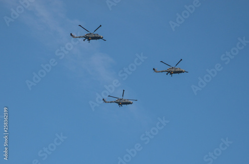 Fototapeta Naklejka Na Ścianę i Meble -  Flying helicopters in the sky. 
