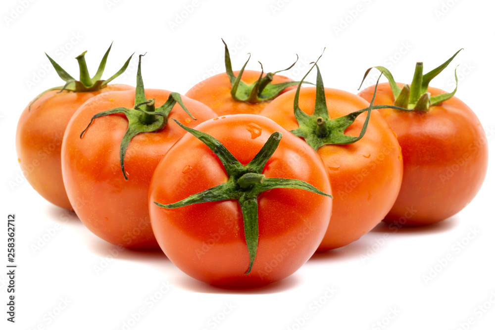 Tomato closeup on white background. Selective focus and crop fragment Tomato closeup on white background. Selective focus and crop fragment