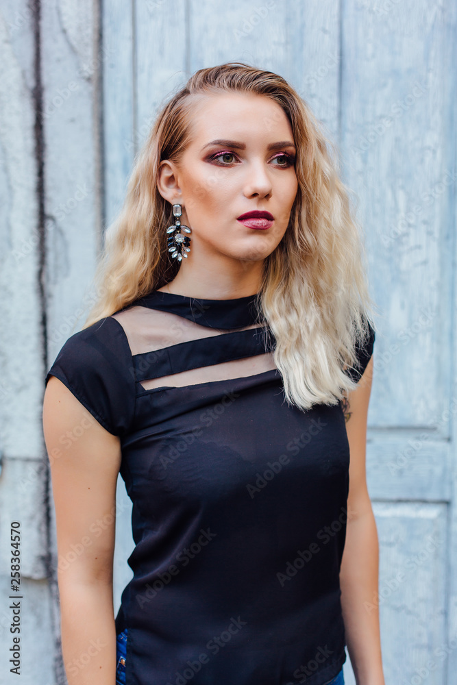 Attractive lady with blond hair and bright makeup Attractive lady with blond hair and bright makeup