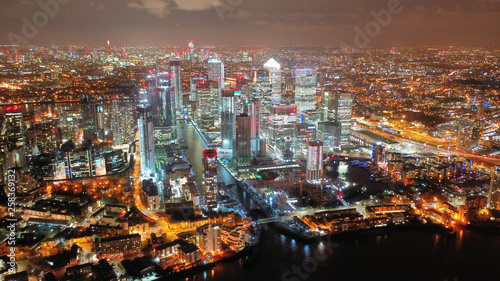 Photography Aerial drone night shot from iconic Canary Wharf skyscrapers business area, Dock