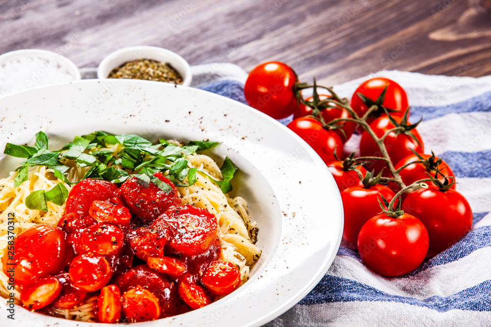 Pasta with tomato sauce and sausage