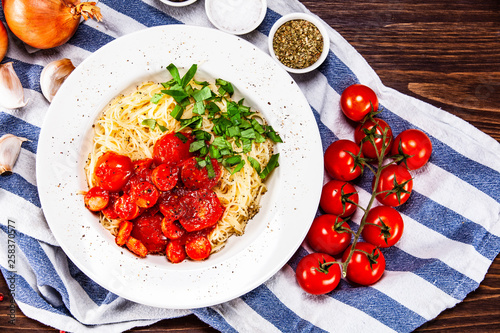 Pasta with tomato sauce and sausage