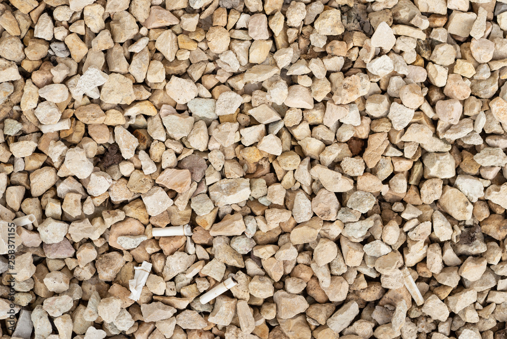 Macro texture of white gravel and concrete slab in half. Macro texture of white gravel and concrete slab in half.
