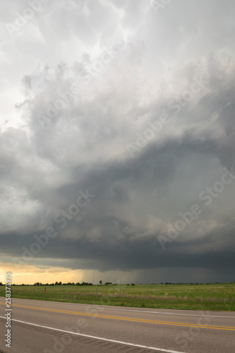 Stormy sky over the road. Severe warned thunderstorm over the Nebraska plains. © Menyhert