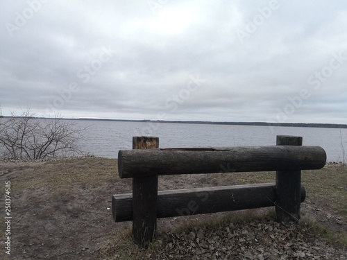 bench on the beach in lake