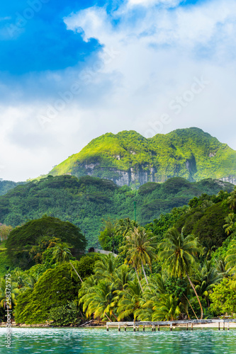 View of the mountain landscape in the lagoon Huahine, French Polynesia. Vertical.