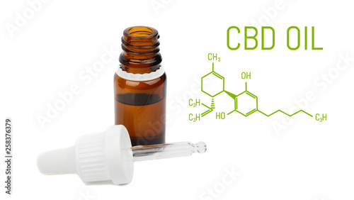 CBD oil dropper bottle, live cannabis resin extraction, isolated on white background -close-up of medical marijuana concept