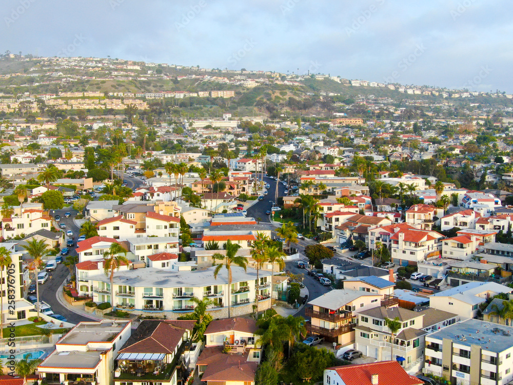 Obraz premium Aerial view of San Clemente beach and coastline before sunset time . San Clemente city in Orange County, California, USA. Travel destination in the South West Coast. Famous beach for surfer.