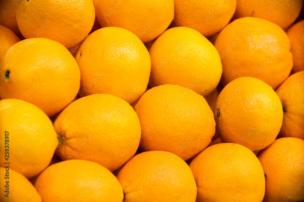 Bunch of oranges in boxes in supermarket Bunch of oranges in boxes in supermarket