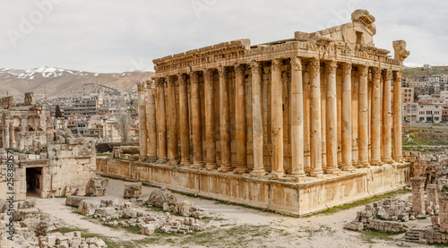 Ancient Roman temple of Bacchus with surrounding ruins and city, Bekaa Valley, Baalbek, Lebanon