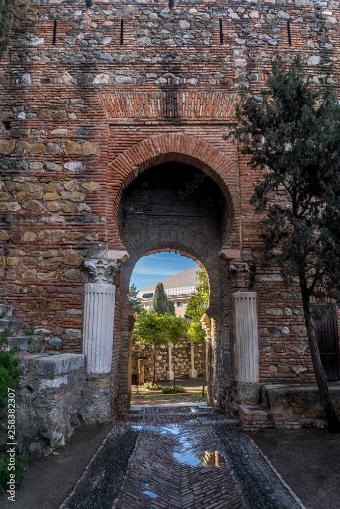Naklejka premium Malaga Alcazaba walls, towers, gates and gardens of the castle