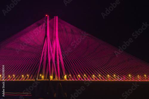The Bandra–Worli Sea Link is a cable-stayed bridge with pre-stressed concrete-steel viaducts on either side that links Bandra in the Western Suburbs of Mumbai with Worli in South Mumbai in India photo