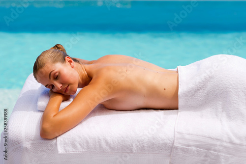 Young woman on massage table