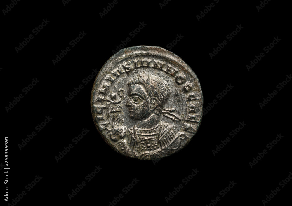 Ancient roman coin with portrait of emperor isolated on black Ancient roman coin with portrait of emperor isolated on black