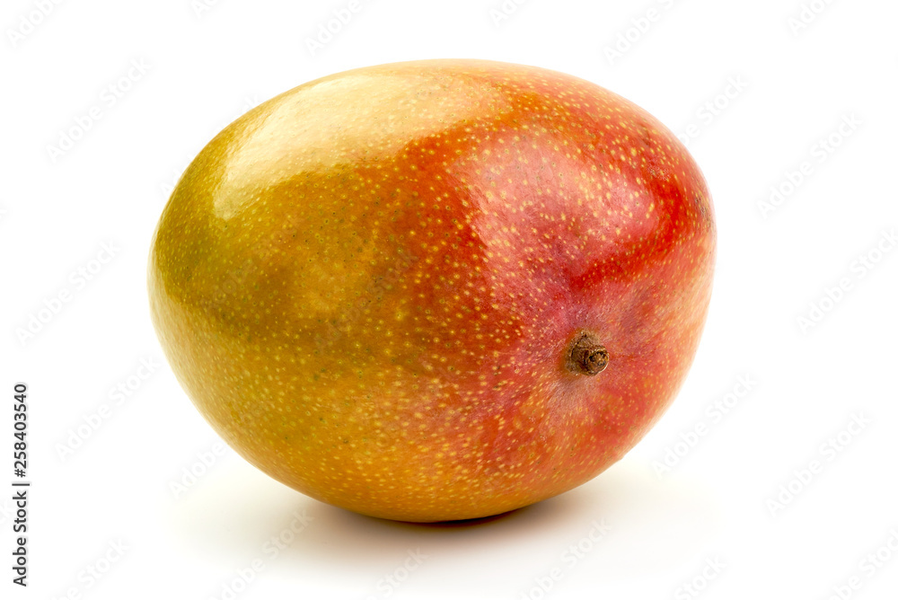 Juicy ripe Mango fruit, close-up, isolated on white background Juicy ripe Mango fruit, close-up, isolated on white background