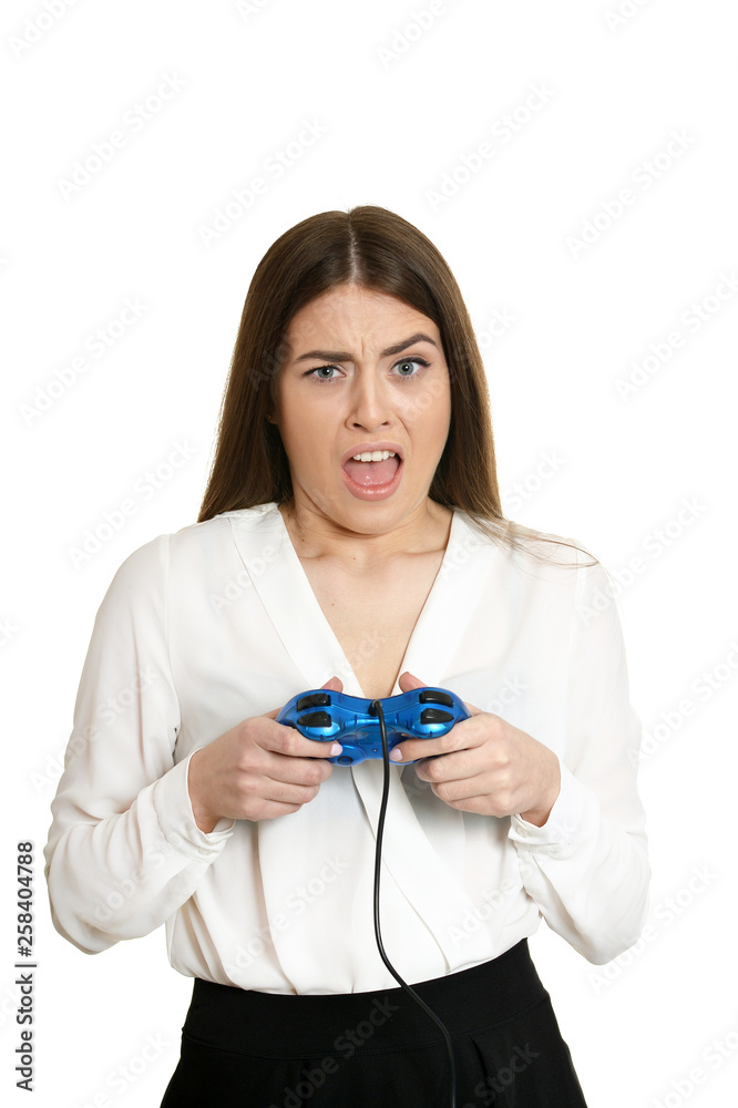 Portrait of the girl is playing video games isolated on white background Portrait of the girl is playing video games isolated on white background