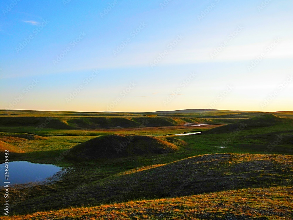 Naklejka premium Lake in the summer tundra. Photo of the landscape in the tundra.