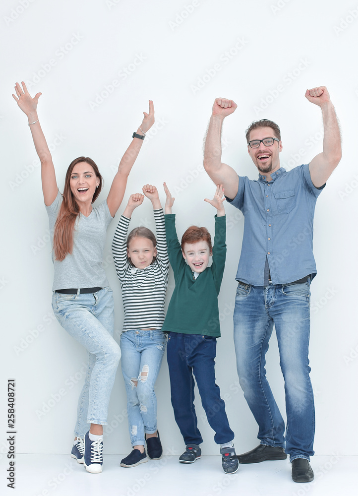 Fototapeta premium in full growth.very happy family with two children