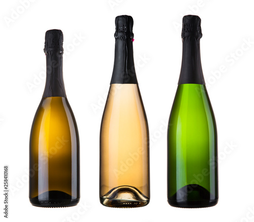 three blank champagne bottles
