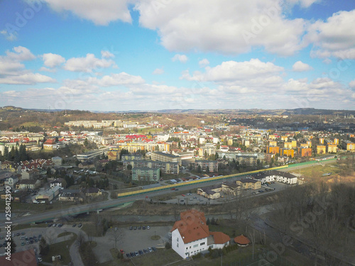 Gorlice, Poland - 3 9 2019: Panorama of a small European medieval city at the present time. View from the drone or quadrocopter on the MOSiR sports complex and the historical center. Landscape Design