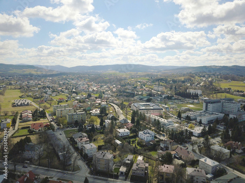 Gorlice, Poland - 3 9 2019: Panorama of a small European medieval city at the present time. View from the drone or quadrocopter on the MOSiR sports complex and the historical center. Landscape Design