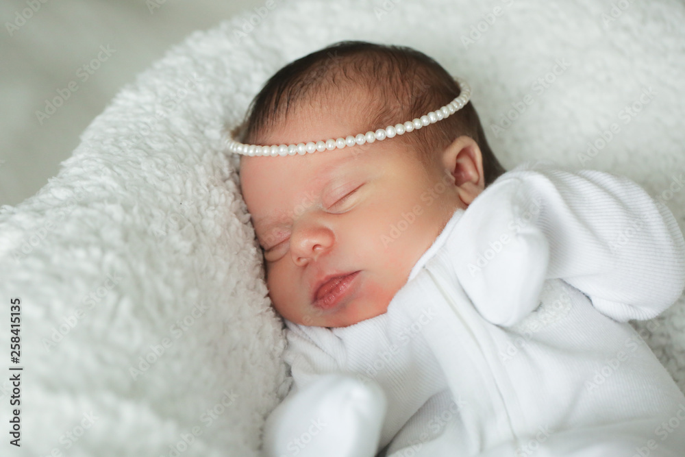 Newborn Cute Baby Girl, Infant, Sleeping on the white bed, New family concept, The most Beautiful Baby Princesse Newborn Cute Baby Girl, Infant, Sleeping on the white bed, New family concept, The most Beautiful Baby Princesse
