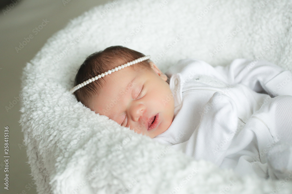 Newborn Cute Baby Girl, Infant, Sleeping on the white bed, New family concept, The most Beautiful Baby Princesse Newborn Cute Baby Girl, Infant, Sleeping on the white bed, New family concept, The most Beautiful Baby Princesse