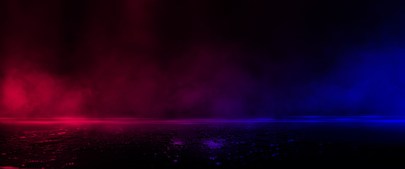 Wet asphalt, reflection of neon lights, a searchlight, smoke.  Smoke, smog. Dark background scene of empty street, night view, night city. Neon red and blue light.