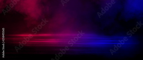 Wet asphalt, reflection of neon lights, a searchlight, smoke. Smoke, smog. Dark background scene of empty street, night view, night city. Neon red and blue light.